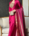 Vision of Confidence in a Stylish Pink Suit