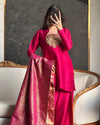 Vision of Confidence in a Stylish Pink Suit